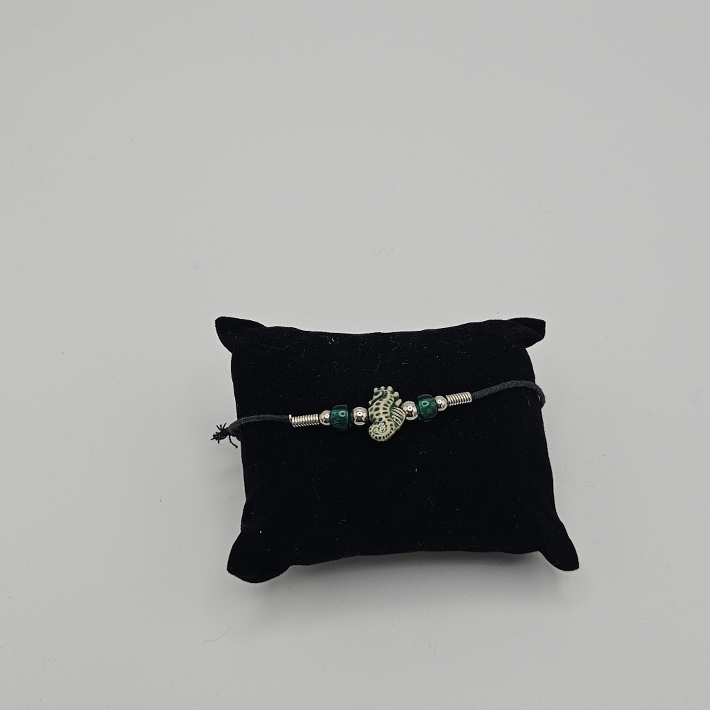 black slider bracelet with green and cream seahorse bead - Picture 2 of 3